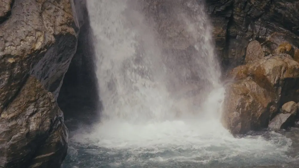 Waterfall beside a mountain road