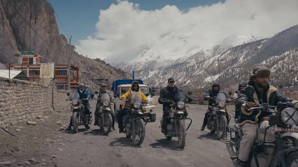 Group of riders on a mountain pass